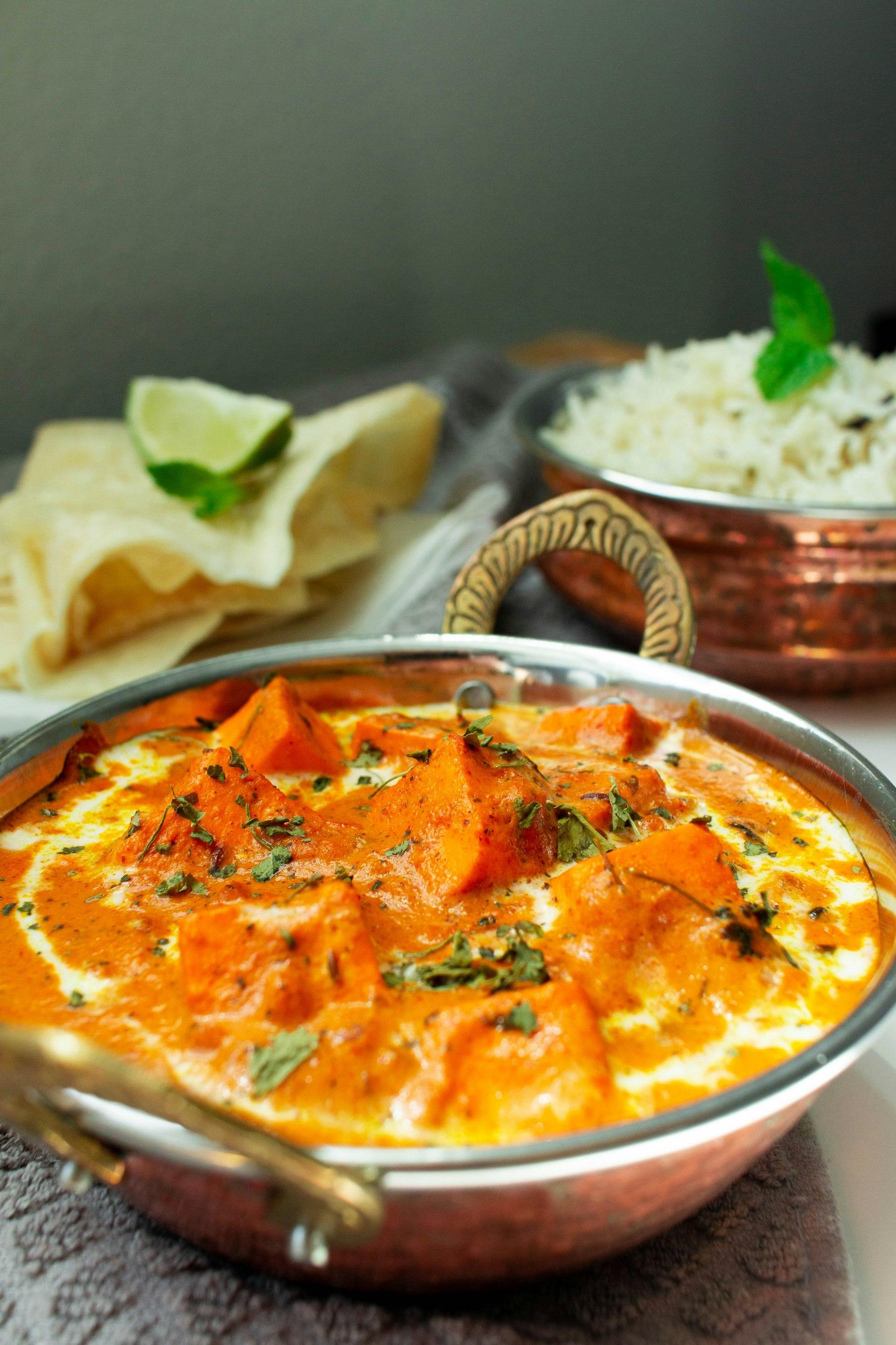 An Indian thali with curries, rice and bread